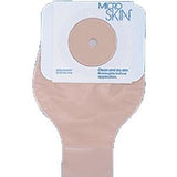 Ostomy pouch with beige barrier and round cutout, medical supply for stoma care