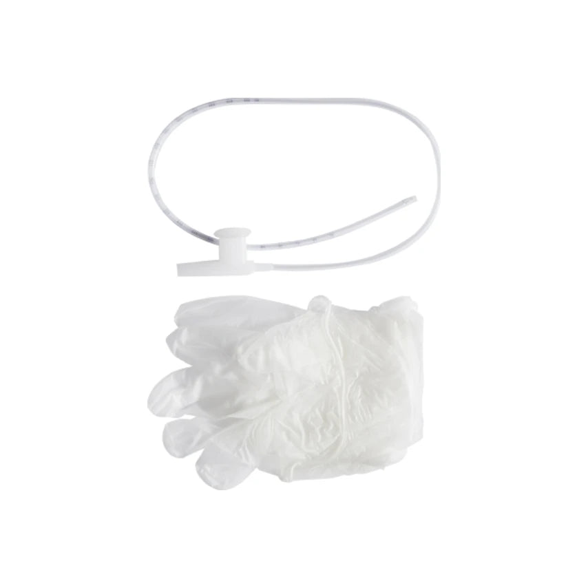 Medical drainage tubing and disposable gloves on a white background