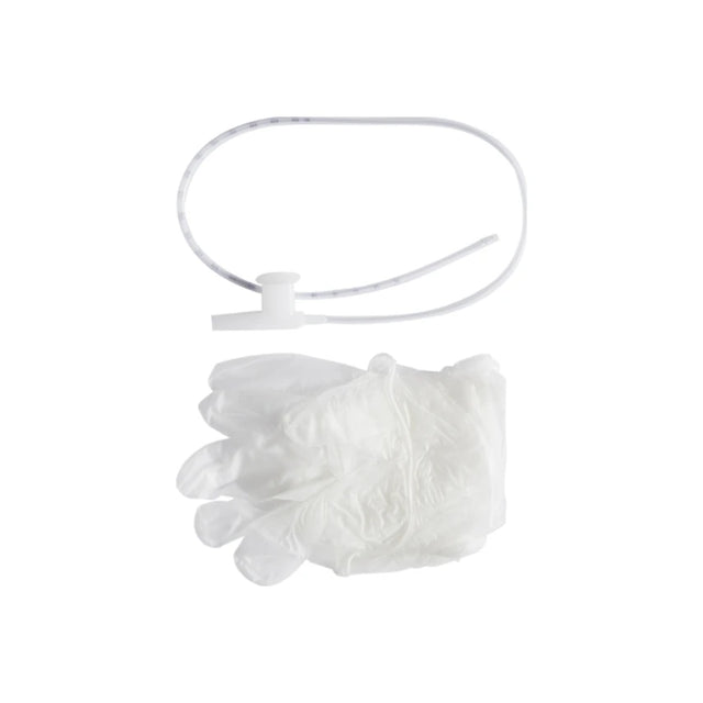 Medical drainage tubing and disposable gloves on a white background