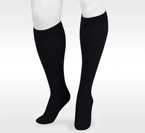 Black knee-high compression socks for medical and circulatory support