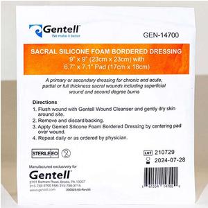 Gentell sacral silicone foam bordered dressing medical supply package with clear product label.
