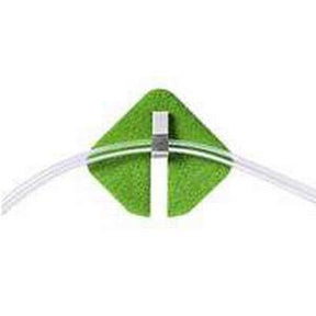 Medical tube securement device with green adhesive pad and clear tubing, home healthcare supply