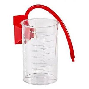 Clear graduated measuring cup with red handle and spout for medical use