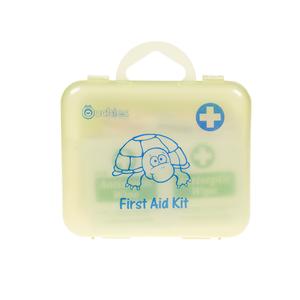 Children's first aid kit with cartoon turtle and medical cross on a light yellow case