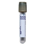 Empty medical blood collection tube with grey cap and labeled for laboratory use