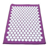 Purple acupressure mat with white pressure point discs, for pain relief and relaxation