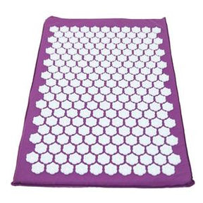 Purple acupressure mat with white pressure point discs, for pain relief and relaxation