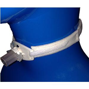 Close-up of a white tracheostomy tube holder on a blue mannequin neck