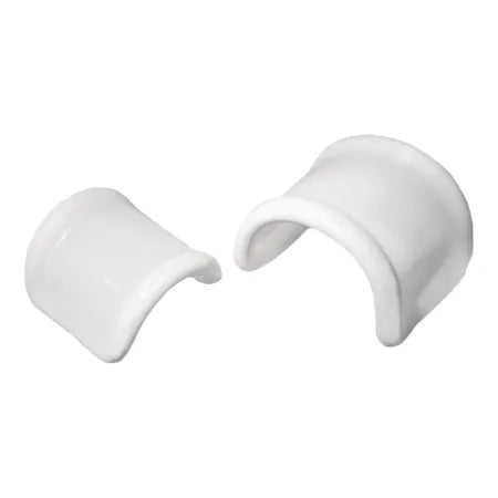 Curved white plastic medical supply clips for home healthcare use on white background
