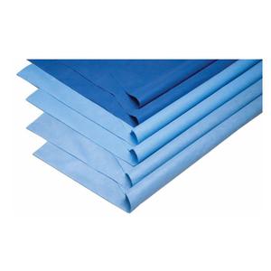 Stack of blue disposable medical underpads for home care and incontinence protection