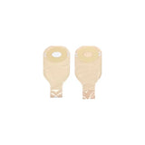 Two beige ostomy pouches with adhesive barrier for stoma care on white background