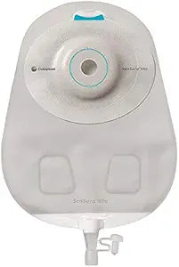 Transparent ostomy bag with adhesive backing and drainable spout for medical use.