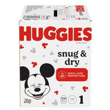 Box of Huggies Snug & Dry disposable diapers with Mickey Mouse design, size 1, 108 count