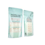 Two light blue resealable bags for medical or nutritional storage, standing upright and labeled with dosage instructions.