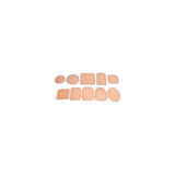Assorted skin-toned hydrocolloid wound dressings in various shapes and sizes on white background