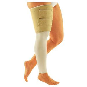 Medical compression leg sleeve with adjustable thigh wrap on model's leg for edema relief