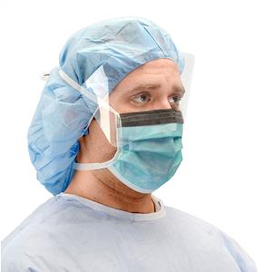 Healthcare worker wearing surgical gown, cap, face mask, and protective face shield