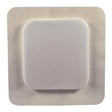 Sterile medical adhesive wound dressing pad with layered, absorbent center on white background