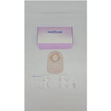 Medical ostomy pouch kit with adhesive barrier and stoma measuring guide on white background