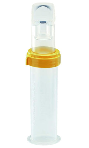 Clear plastic inhaler spacer with yellow cap for asthma and respiratory therapy