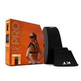 Precut black kinesiology tape roll next to orange box with woman applying tape on shoulder