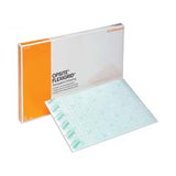 Opsite Flexigrid transparent wound dressing with box and grid pattern visible