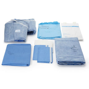 Sterile blue and white medical drapes and supplies laid out for home healthcare use