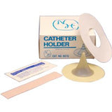 Catheter holder kit with adhesive strip, packaging, and medical supplies on white background