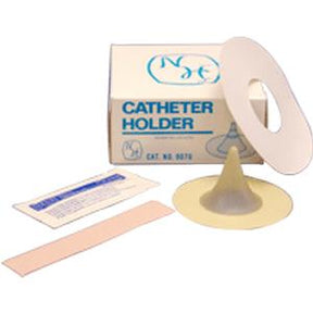 Catheter holder kit with adhesive strip, packaging, and medical supplies on white background