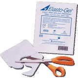 Elasto-Gel cast and splint padding with medical scissors on white background