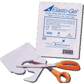 Elasto-Gel cast and splint padding with medical scissors on white background