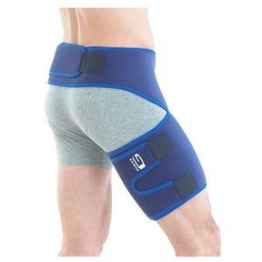 Person wearing a blue hip and thigh compression brace for support and pain relief