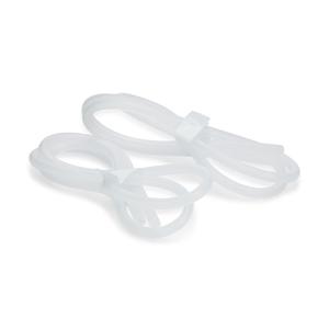 Clear medical tubing set coiled on a white background, essential medical supply.