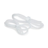 Clear medical tubing set coiled on a white background, essential medical supply.