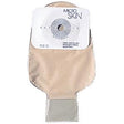 One-piece beige ostomy pouch with cut-to-fit skin barrier for medical use