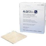 Calcium alginate wound dressing with antimicrobial silver and box packaging