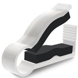 Plastic tube clamp for medical tubing, white with black grip, on white background