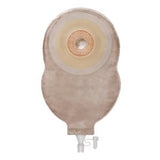 Beige medical ostomy pouch with drainable outlet and adhesive barrier on white background