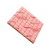 PolyMem Max medical foam dressing for wound care, grid pattern, red text on white pad