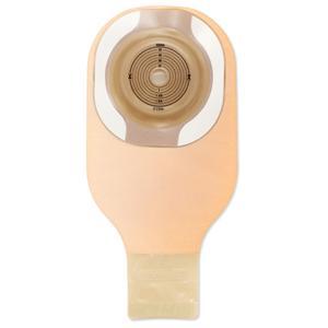 Beige ostomy pouch with adhesive barrier for medical stoma care, flat drainable design.