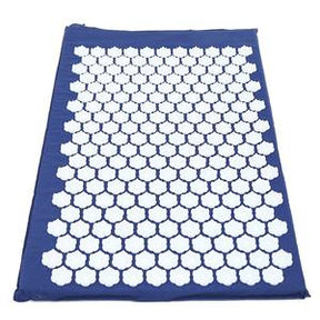 Blue acupressure mat with white plastic spike discs for pain relief and relaxation
