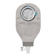 Closed pouch medical ostomy bag with filter and drainable spout on white background