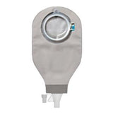 Closed pouch medical ostomy bag with filter and drainable spout on white background