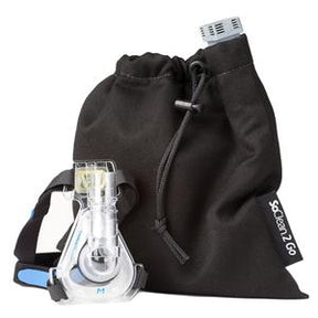 CPAP mask and portable black carrying bag for home medical respiratory supplies