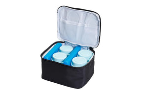 Insulated medical travel bag with blue ice packs and storage containers for medication