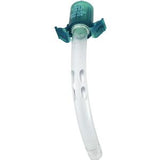 Curved medical tracheostomy tube with green connector for respiratory care