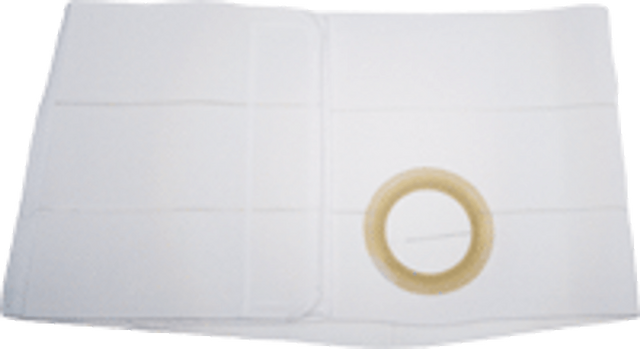 White medical support belt with a circular stoma opening, laid flat on a surface.