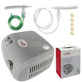 Compressor nebulizer kit with tubing, mouthpiece, filters, and product box for respiratory care