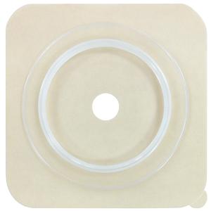 Square beige ostomy barrier with central hole for medical supplies