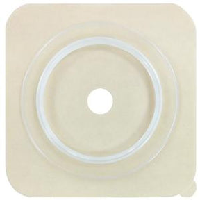 Square beige ostomy barrier with central hole for medical supplies